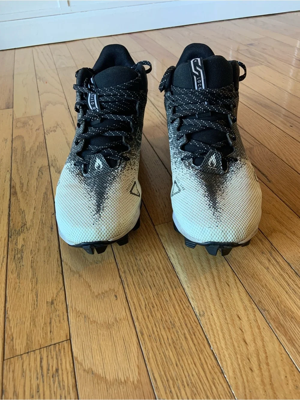 Under Armour Black and Cream Gradient Athletic Cleats